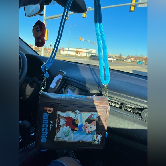 New Loungefly Pinocchio Storybook Convertible Backpack & Crossbody Bag - Picture 11 of 15